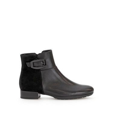 Bottines noires en combinaison cuirs